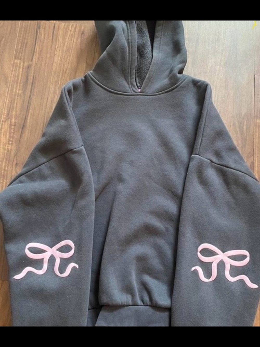 Edikted Black Hoodie with Pink Bow Sleeve Accents